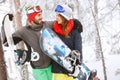 Young snowboarders on mountain