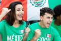 Young soccer fans from Mexico with mexican flag Royalty Free Stock Photo