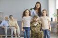 Portrait of happy young soldier together with his family upon returning back home Royalty Free Stock Photo