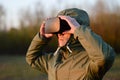 Young soldier holding hands on virtual reality glasses Royalty Free Stock Photo