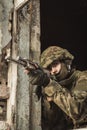 Young soldier with pistol Royalty Free Stock Photo