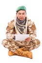 Young soldier using his tablet computer