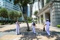 Young soldiers walking on street in Singapore