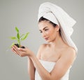 Young Spa Model Holding Green Bamboo and Black Stones Royalty Free Stock Photo