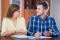 Family couple at desk with financial documents indoors Royalty Free Stock Photo