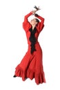 Young Spanish woman dancing flamenco with castanets in her hands Royalty Free Stock Photo