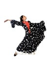 Young Spanish woman dancing flamenco in typical folk dress Royalty Free Stock Photo