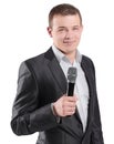 Young speaker with a microphone.isolated on white background Royalty Free Stock Photo