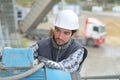 Young specialist using steel bending machine Royalty Free Stock Photo