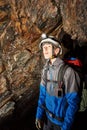 Cave exploration with helmet and headlight Royalty Free Stock Photo