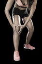 young sport woman holding injured knee suffering pain in ligaments injury or pulled muscle Royalty Free Stock Photo