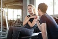 young sport woman exercise doing sit ups on the bench in fitness gym healthy .Muscular girl in sportswear training abs with Royalty Free Stock Photo