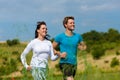 Young sportive couple is jogging outside Royalty Free Stock Photo