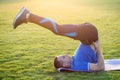 Young sportive man doing exercises in morning field outdoors Royalty Free Stock Photo