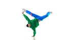 Young sportive man performing dance, hip-hop, breakdance elements in motion against white background. Royalty Free Stock Photo