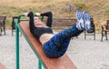 Young sports girl doing exercises on the abs. Royalty Free Stock Photo