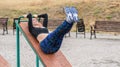 Young sports girl doing exercises on the abs. Royalty Free Stock Photo