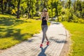 Young sports girl posing in the park Royalty Free Stock Photo