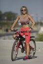 Sports positive woman on a bike