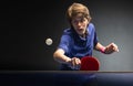 Young sportsman playing table tennis Royalty Free Stock Photo