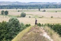 Young sportsman standing on the top of the hill Royalty Free Stock Photo