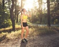 Young sportswoman drinking water after run, sport exercises, fit