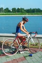 The young sportswoman finish a bicycle stage Royalty Free Stock Photo