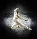 A young and sporty man doing a modern dance pose Royalty Free Stock Photo