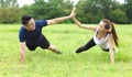 Young sporty couple working out together outdoors Royalty Free Stock Photo