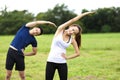 Young sporty couple working out together outdoors Royalty Free Stock Photo