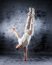 A young and sporty man doing a modern dance pose Royalty Free Stock Photo