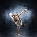 A young and sporty man doing a modern dance pose Royalty Free Stock Photo