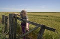 Young sporty woman, does stretching exercise in wheat field Royalty Free Stock Photo