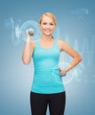 Young sporty woman with light dumbbells Royalty Free Stock Photo