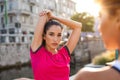 Woman stretching arms over head