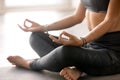 Young sporty yogi woman practicing yoga, Sukhasana pose Royalty Free Stock Photo