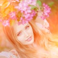 Young spring fashion woman in spring garden. Springtime. Trendy Royalty Free Stock Photo