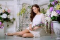 Young spring fashion woman in spring lux vintage interior. Springtime. Trendy girl on a luxury spring background. Allergic to pol Royalty Free Stock Photo