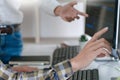 Young startup Programmers Sitting At Desks Working On Computers screen for Developing programming and coding to find solution to Royalty Free Stock Photo