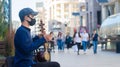 Young street musician performer on Yerevan North avenue after covid 19 lockdown