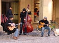 Young street performers playing jazz music. Bologna, Italy