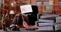 Young Stressed Female Lawyer Working