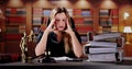 Young Stressed Female Lawyer Working