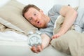 Young stressed man waking up and shoked Royalty Free Stock Photo