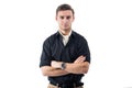 Young strong businessman in black shirt with