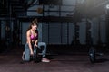 Young strong muscular fit girl with big muscles preparing for hard strength weightlifing or dead lift cross workout training Royalty Free Stock Photo