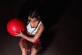 Young strong serious sweaty focused athlete fit muscular woman with big muscles holding heavy kettlebell weight barbell dumbbell Royalty Free Stock Photo