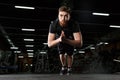 Young strong sports man make sport exercise in gym Royalty Free Stock Photo