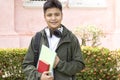 Young Student with Bag and Books Royalty Free Stock Photo