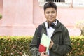 Young Student with Bag and Books Royalty Free Stock Photo